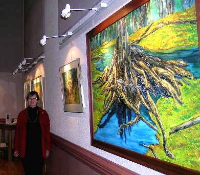 Olja Müller ­ in the foreground her large  painting  "Forest Monolith".<br>   Photo:  V. Külvet - pics/2005/11496_3.jpg