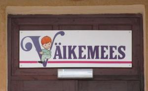 Seen on a street in the north-eastern Estonian city of Kohtla-Järve. What could be behind a door with a sign above it reading Väikemees (Little Man)? The building is surrounded by an enclosed yard and has playground equipment in the back. My first thought: "Could this be a private boys kindergarten?" Photo: Riina Kindlam<br><br> - pics/2012/05/36260_003_t.jpg